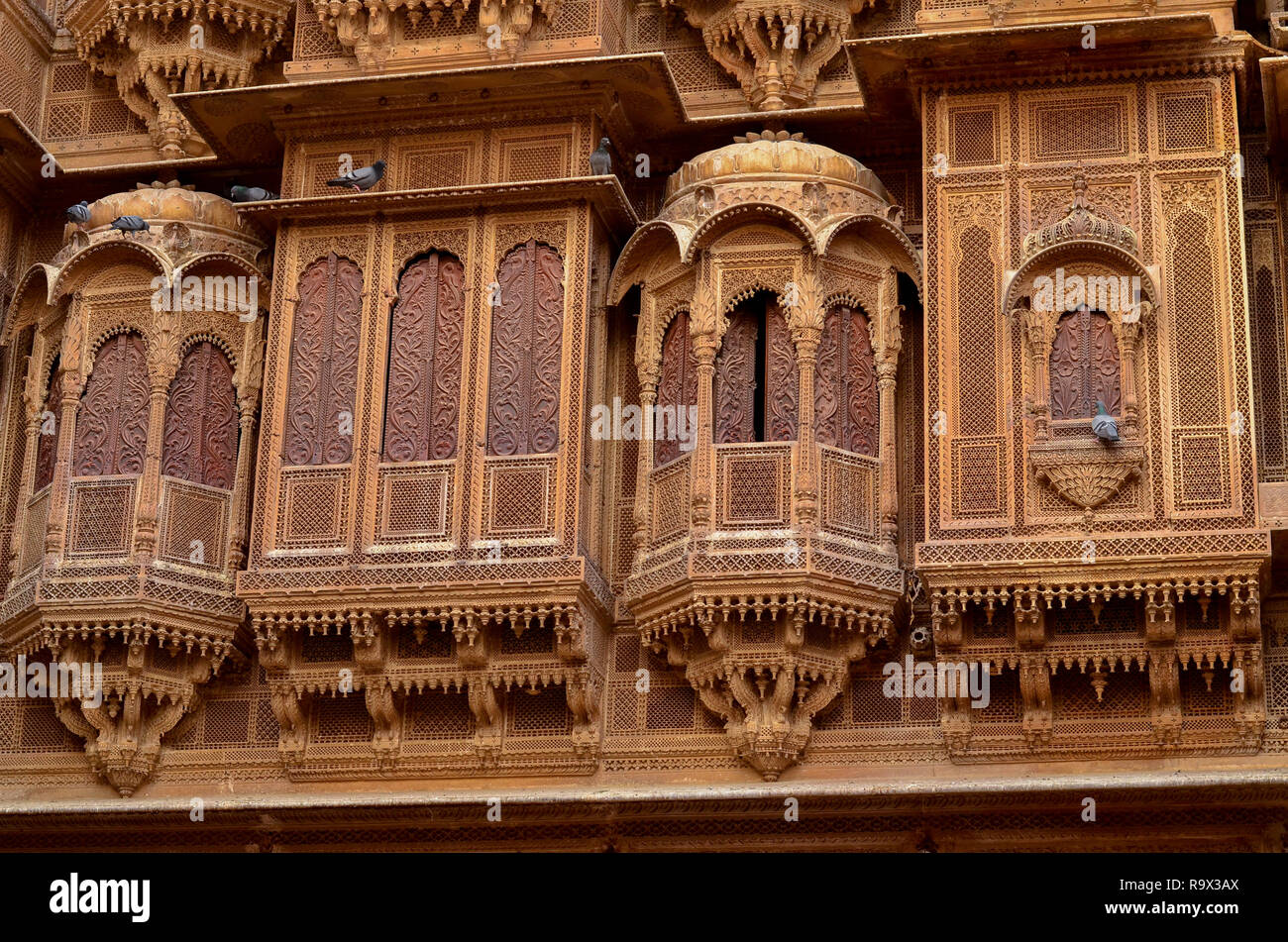 Traditional Rajasthani haveli with a decorated window at Patwon ki