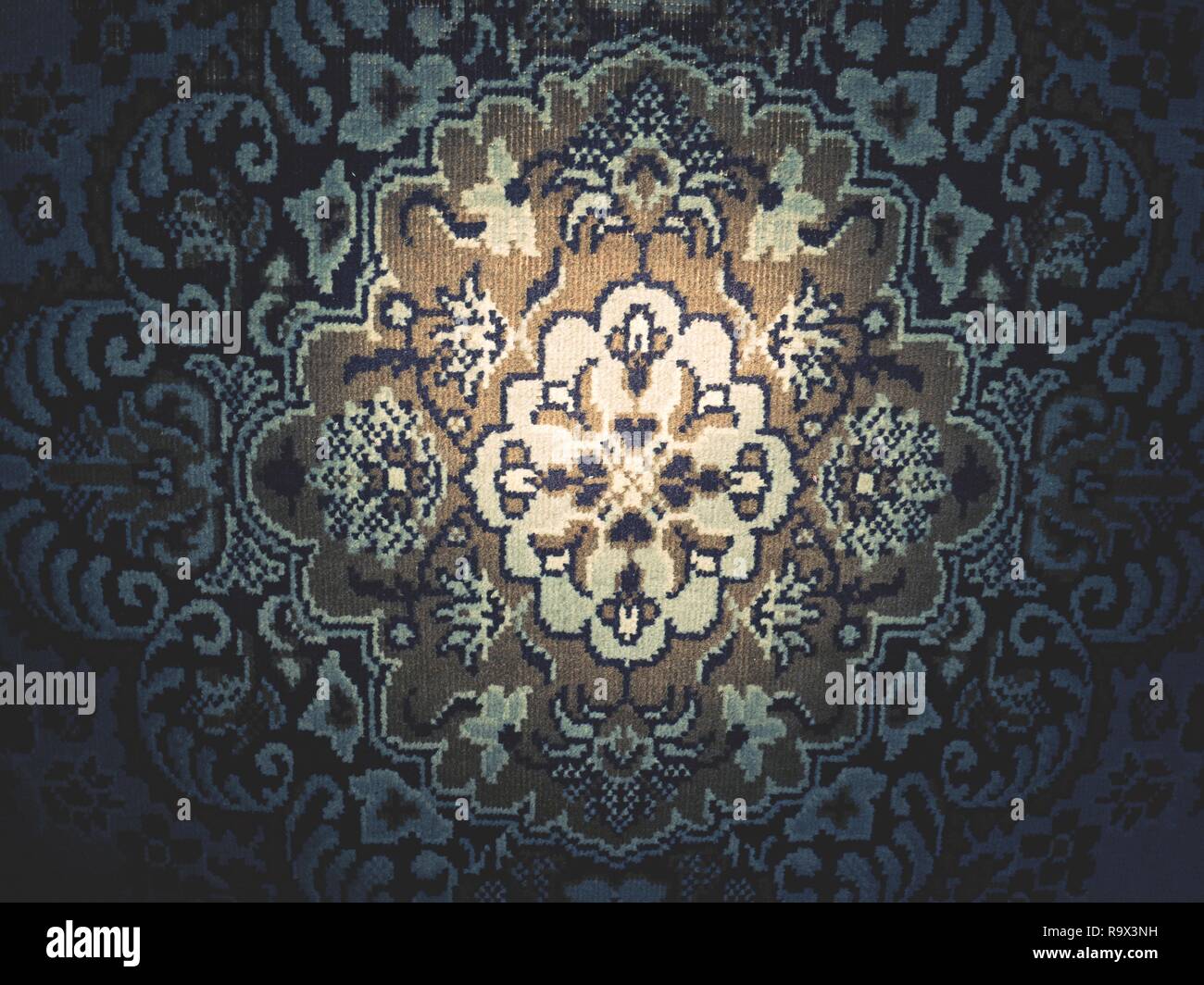 Old worn carpet in detail. Weaving texture or weaving pattern