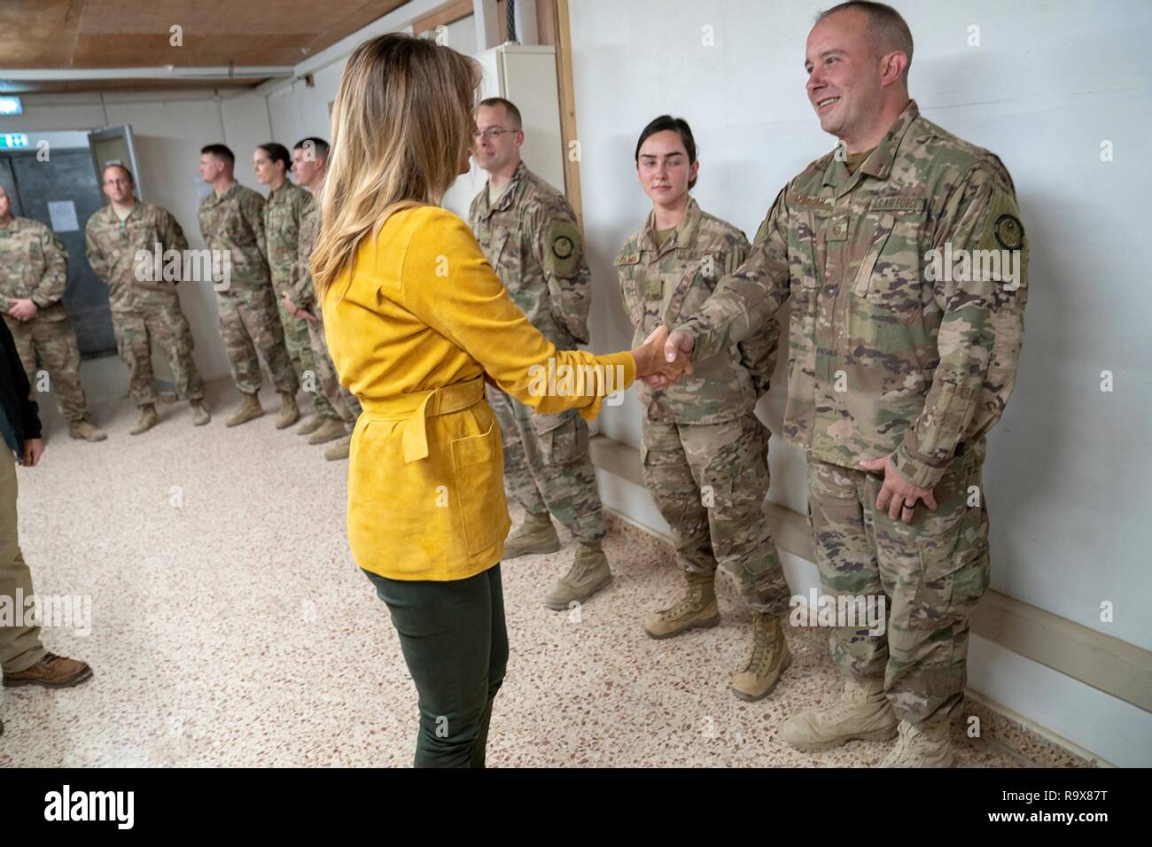 U.S. First Lady Melania Trump greets U.S. service members during a surprise visit to Al Asad Air Base December 26, 2018 in Al Anbar, Iraq. The president and the first lady spent about three hours on Boxing Day at Al Asad, located in western Iraq, their first trip to visit troops overseas since taking office. Stock Photo