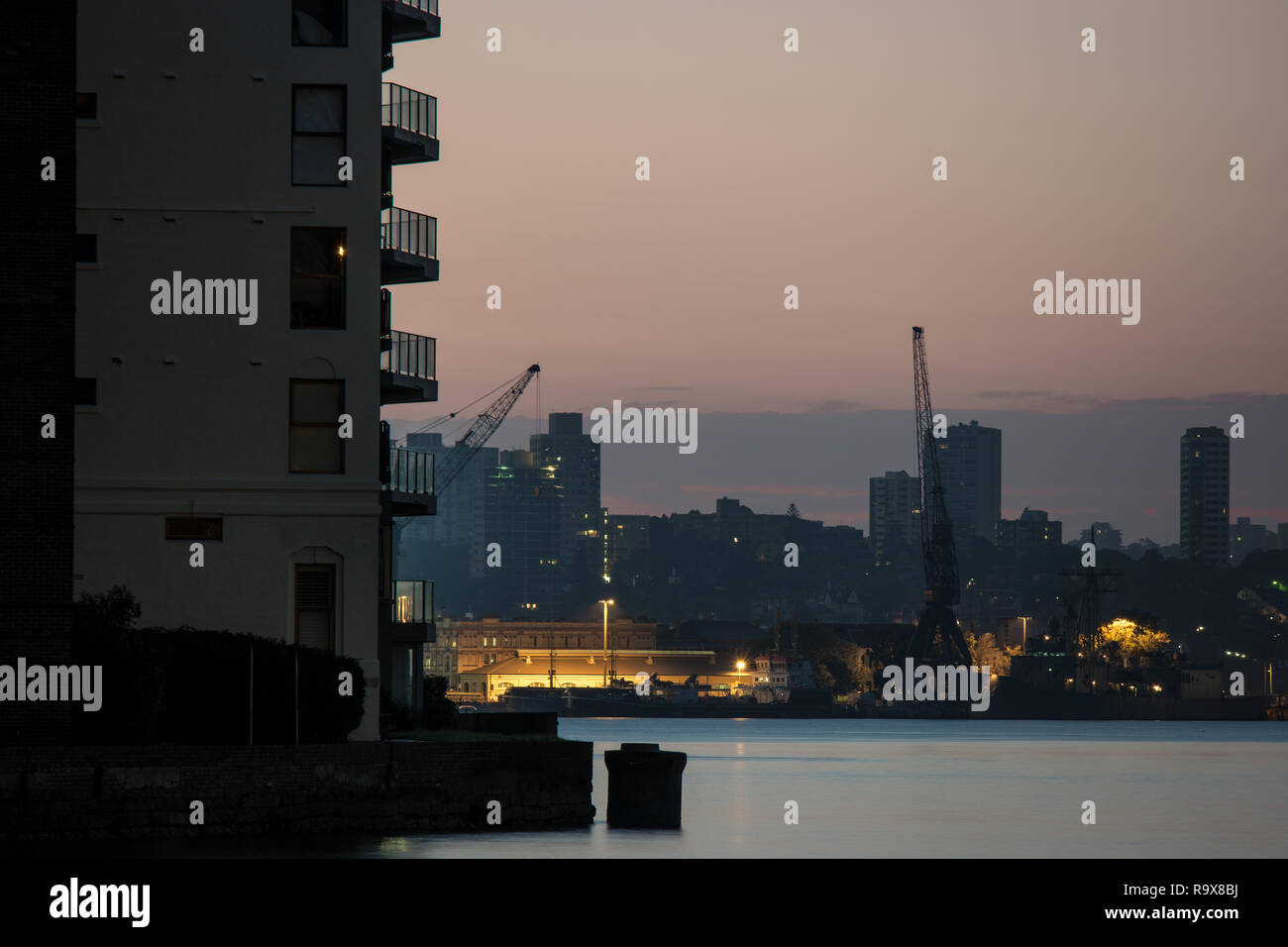 apartment balconies and navy base at dawn Stock Photo