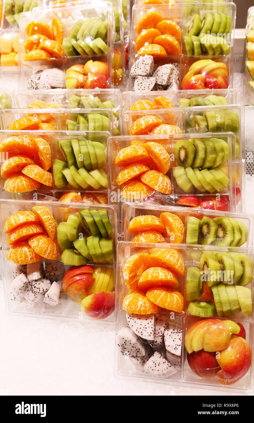 Sliced packed fruits in a shop Stock Photo Alamy