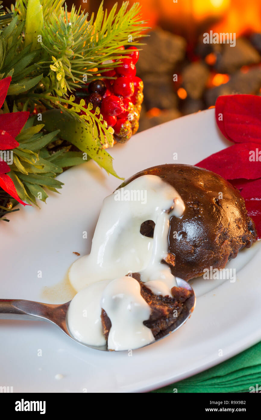 Traditional Christmas pudding with Brandy sauce Stock Photo - Alamy