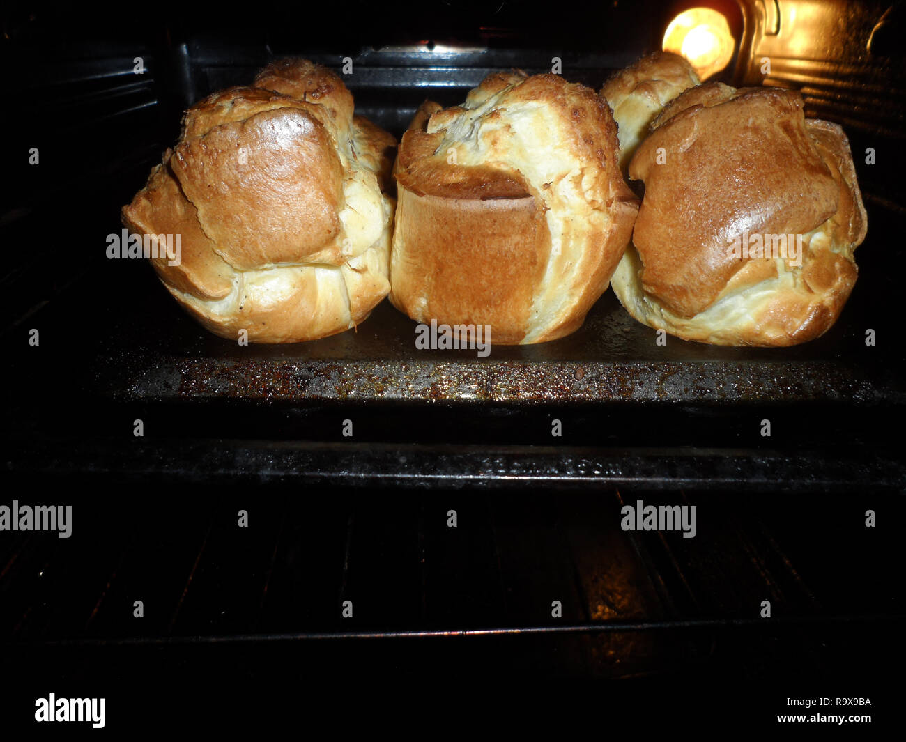 Yorkshire pudding in a Yorkshire pudding baking tin fresh from the oven made to a traditional Yorkshire recipe. Stock Photo
