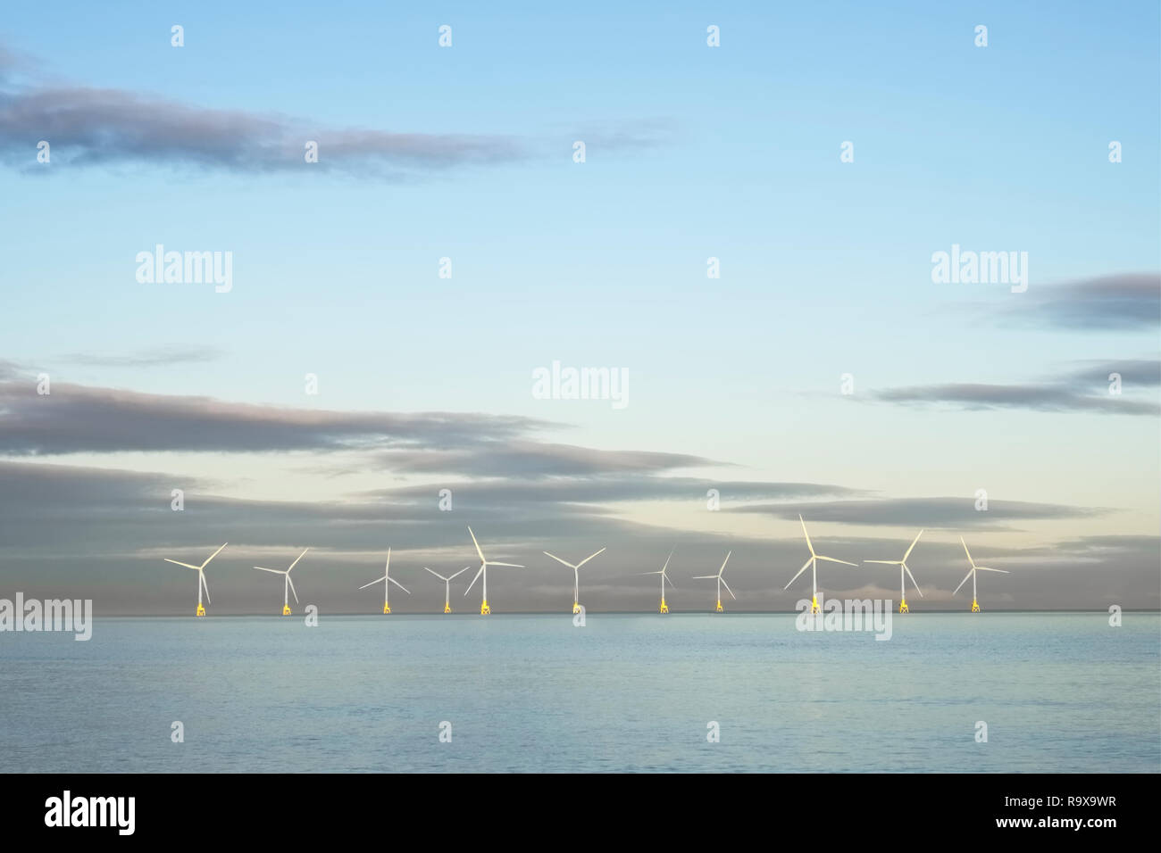 Wind Farm In North Sea Ocean Floating Turbines On Horizon Offshore