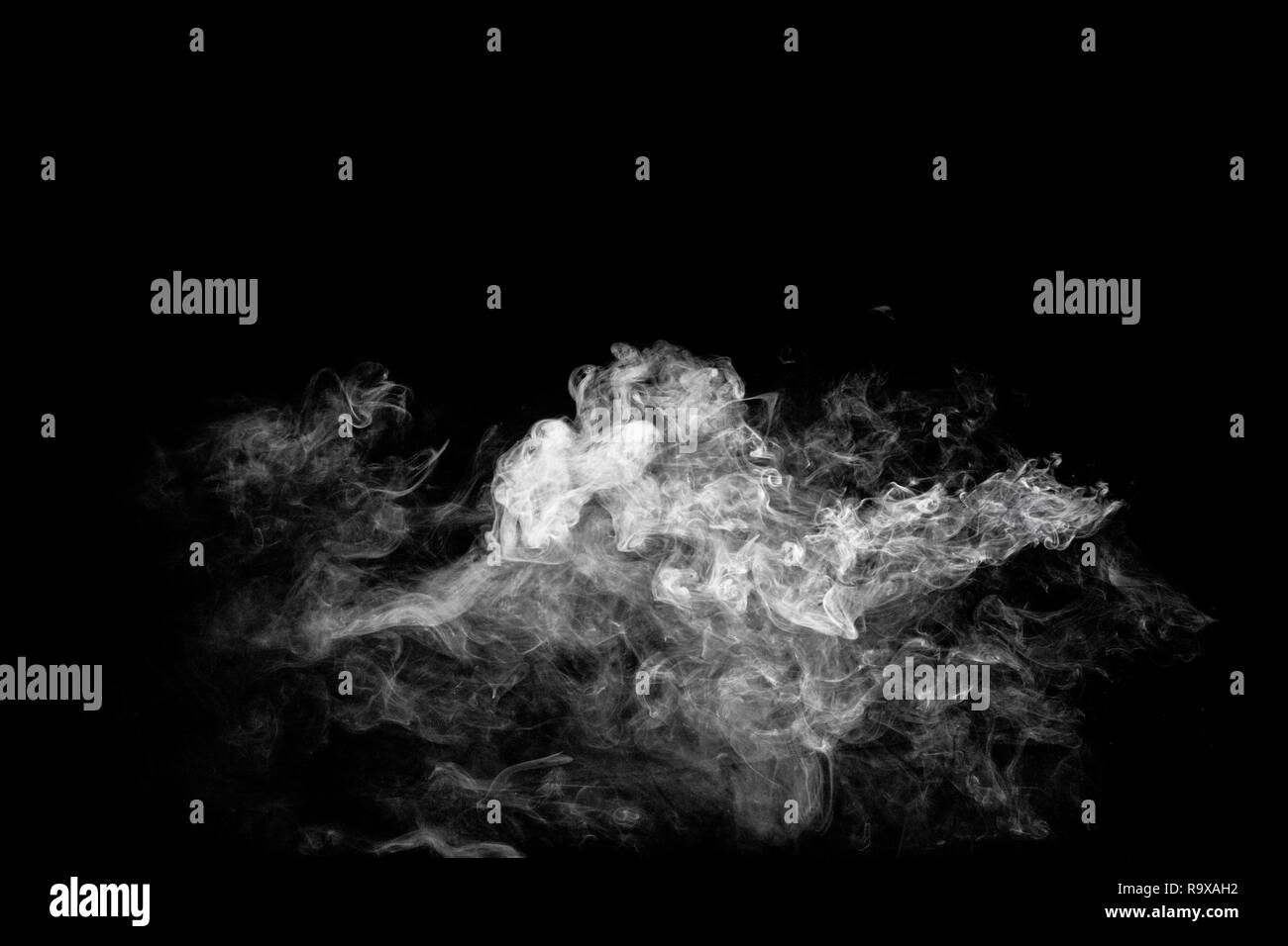 Abstract  smoke on black background.  White smoke cloud. Stock Photo