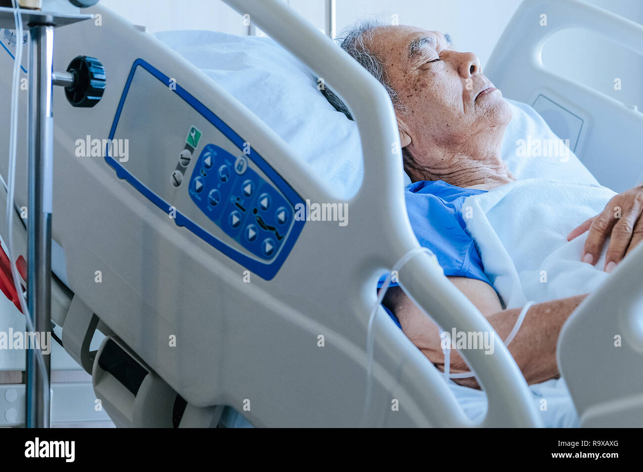 Elderly patients in hospital bed Stock Photo Alamy