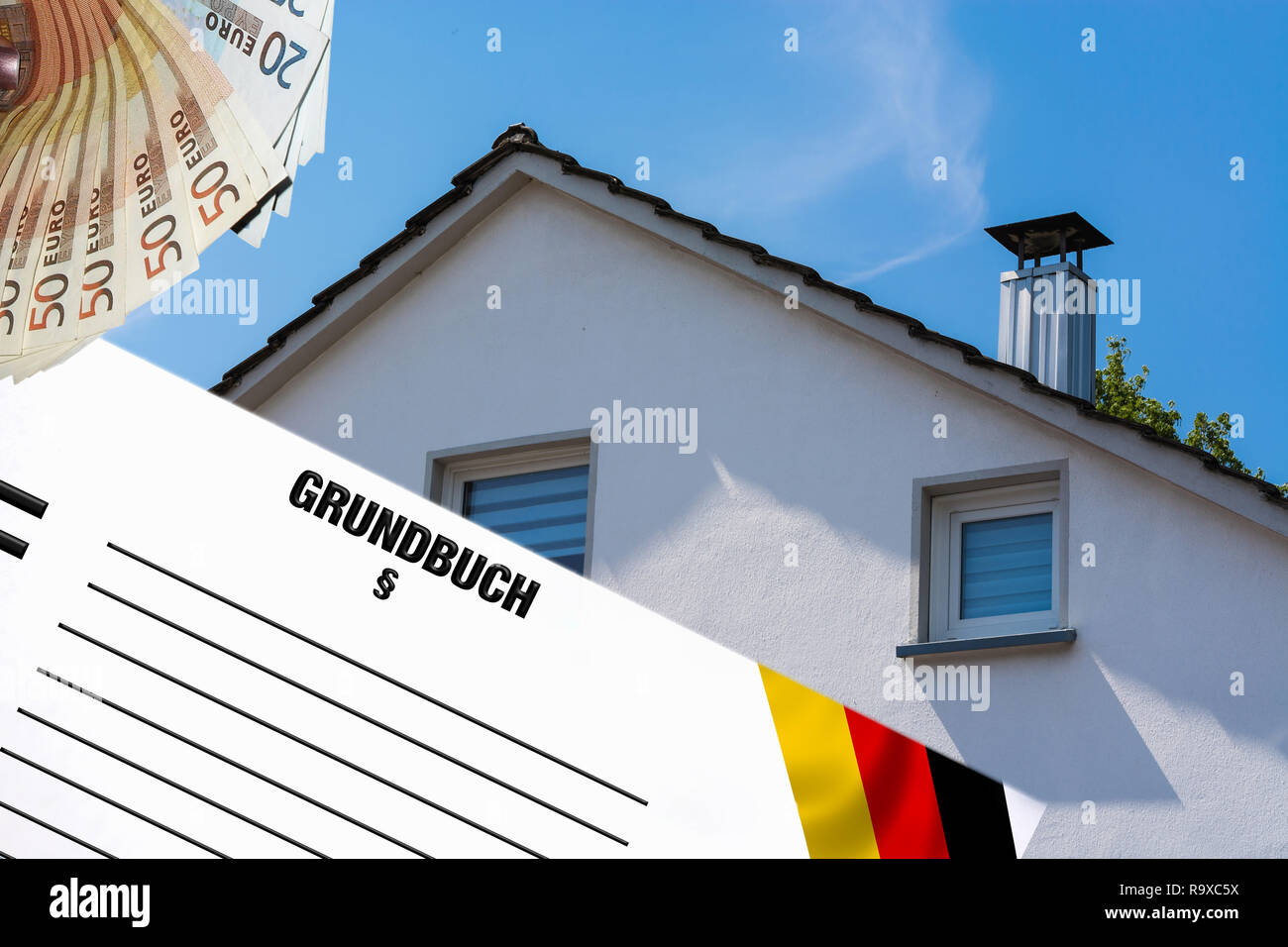 Gable side of a multi-family house of the 60s after the modernization against the blue sky. In the foreground white note with inscription in german la Stock Photo