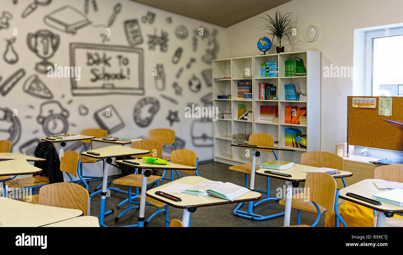 Interior of classroom in the modern school. School board, desks, textbooks.  Back to school Stock Photo - Alamy