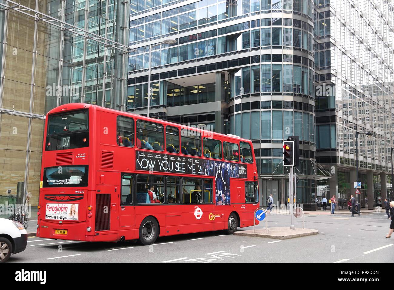LONDON, UK - JULY 8, 2016: People ride a double decker bus in Canary Wharf,  London, UK. Transport for London (TFL) operates 8,000 buses on 673 routes  Stock Photo - Alamy