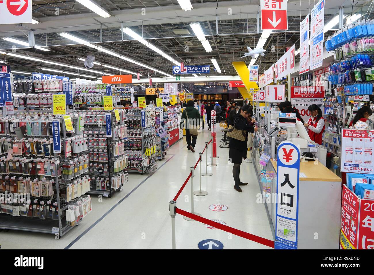 TOKYO, JAPAN - NOVEMBER 29, 2016: People visit electronics store in Tokyo, Japan. Retail sales amounted to137.6 trillion yen in Japan in 2012. Stock Photo