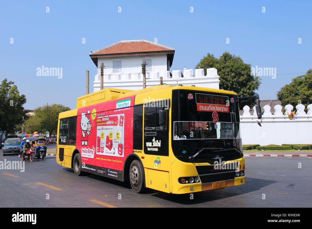 BANGKOK, THAILAND - DECEMBER 22, 2013: People ride a city bus in ...