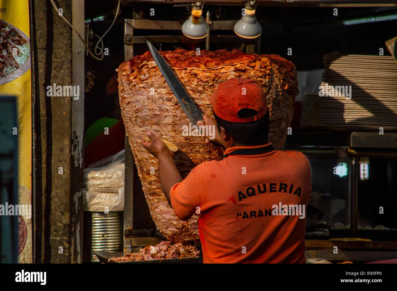 A man cutting meat for a taco in Mexico City, Mexico Stock Photo Alamy