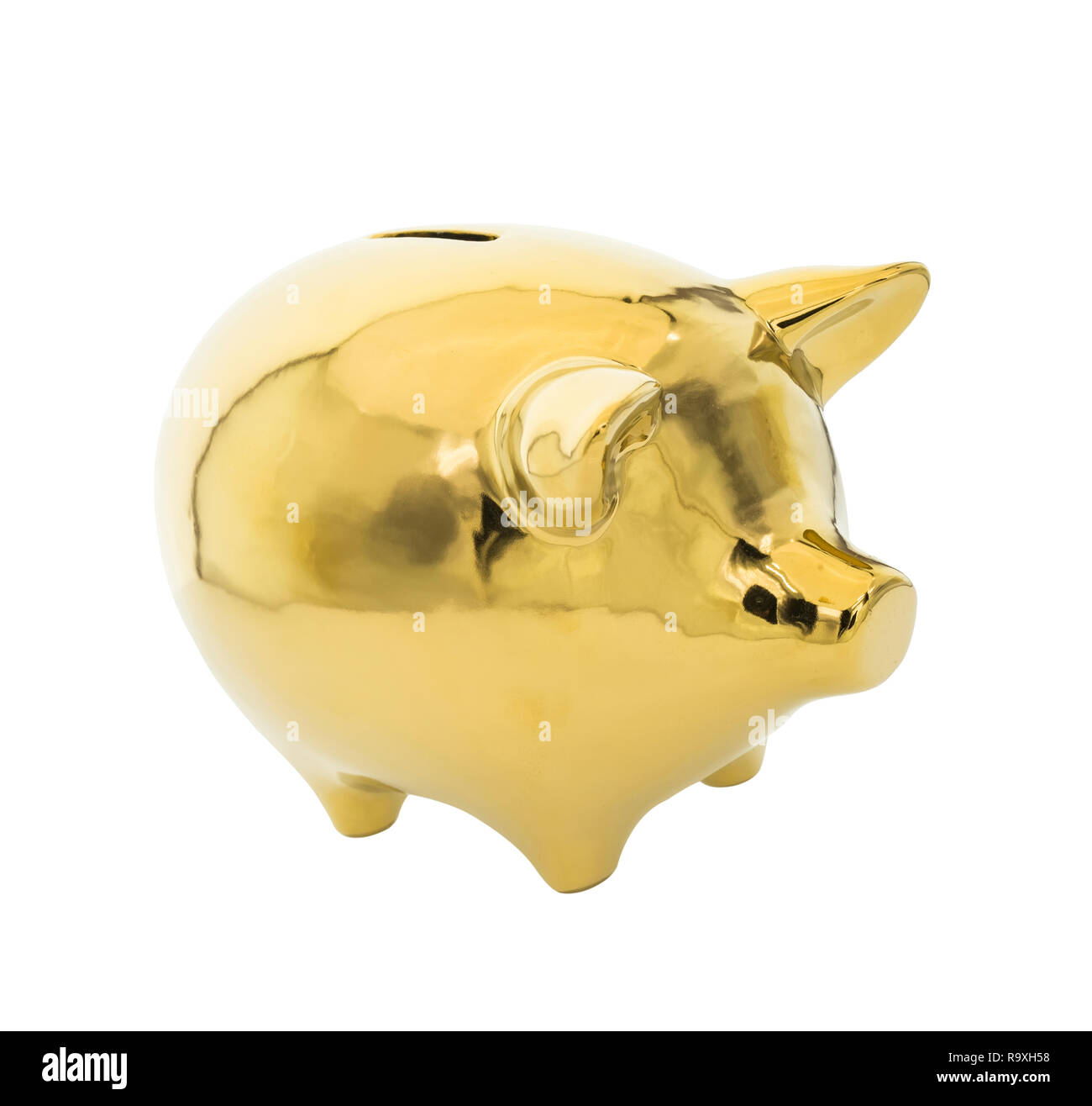 gold piggy bank isolated on white background Stock Photo - Alamy