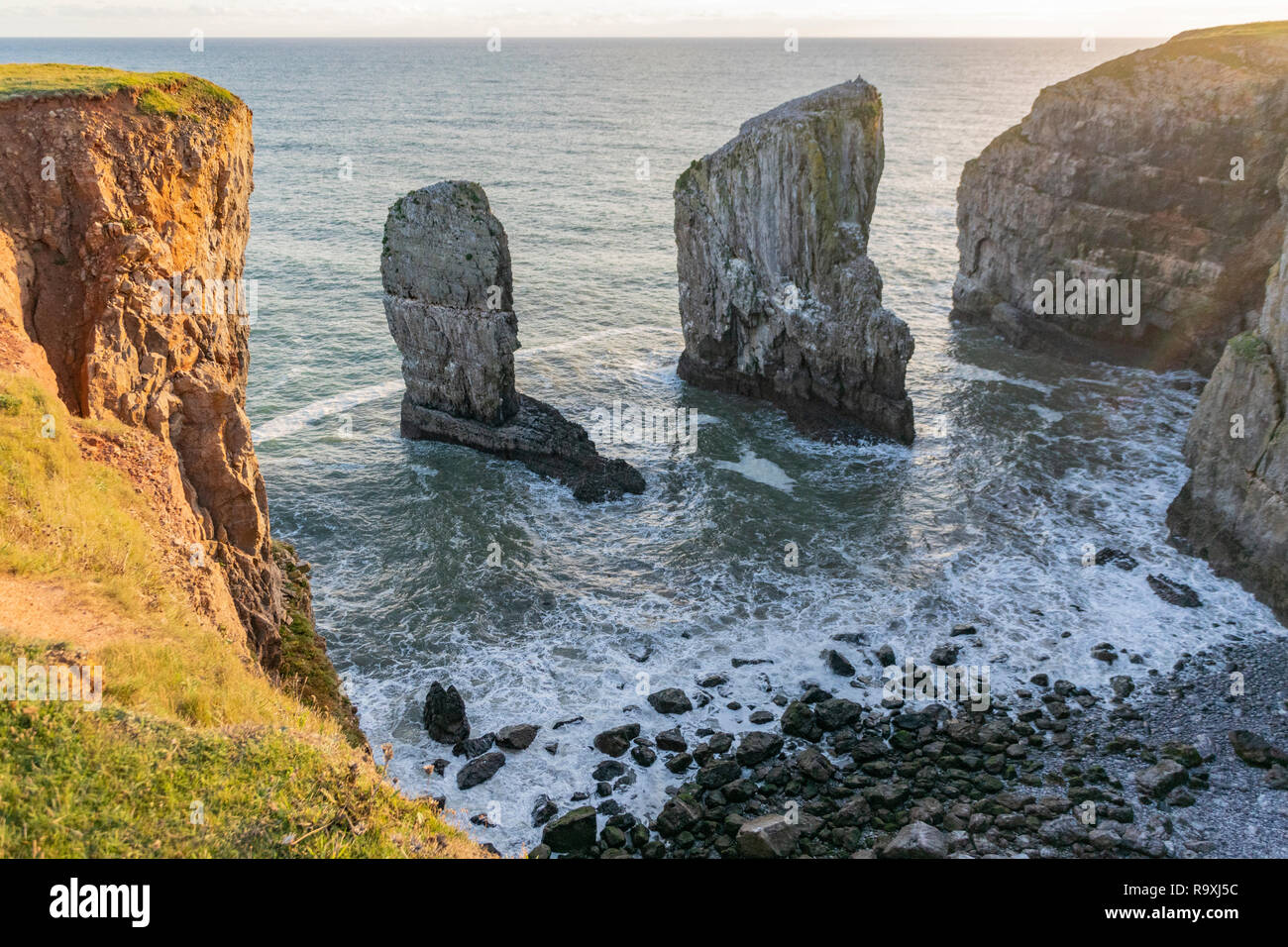 Aerial Views Over Stack Rocks Castlemartin Pembrokeshire Wales Stock aerial-views-over-stack-rocks-castlemartin-pembrokeshire-wales-stock