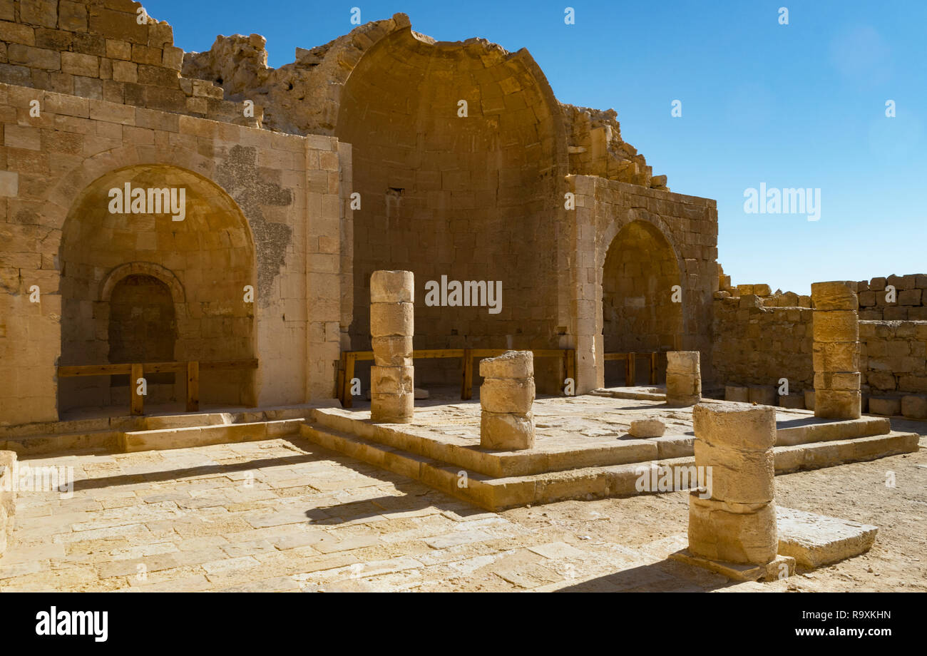 ruins of byzantine church showing three apses, a raised platform, and columns at shivta national park in israel Stock Photo