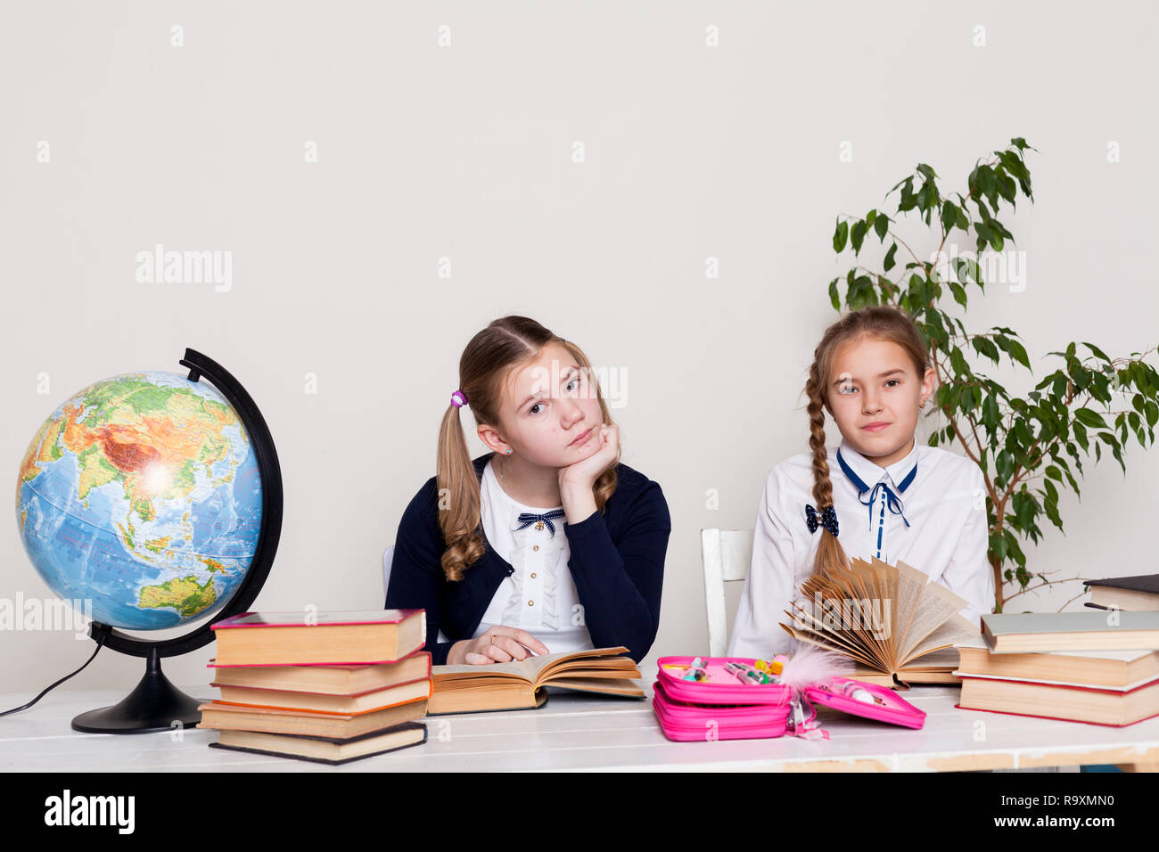 girls at school in the classroom for books of knowledge Stock Photo - Alamy