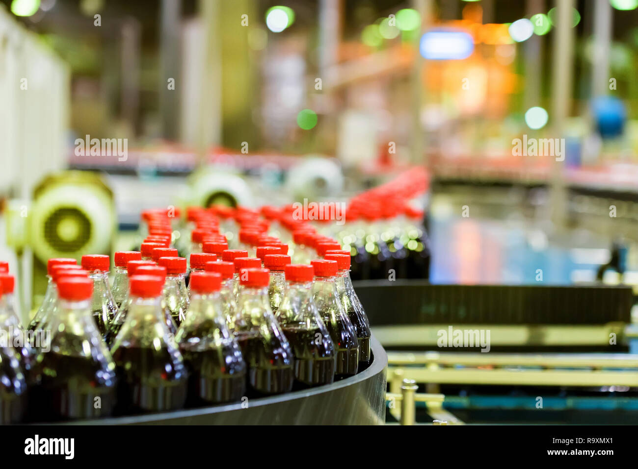 Close up bottle line and soft drinks factory interior Stock Photo Alamy
