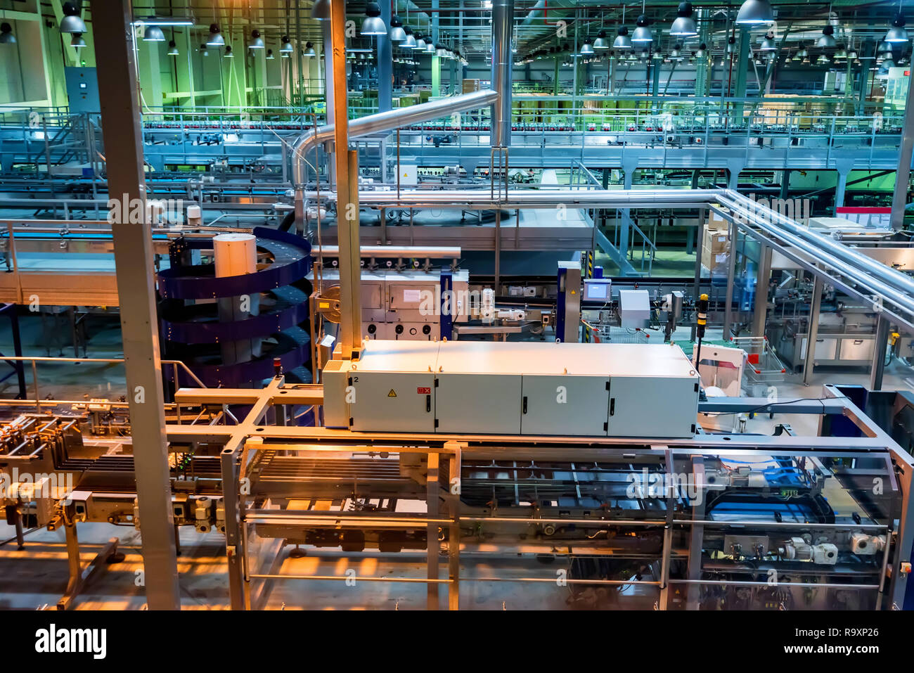 View of tubes and appliances at soft drinks factory Stock Photo Alamy