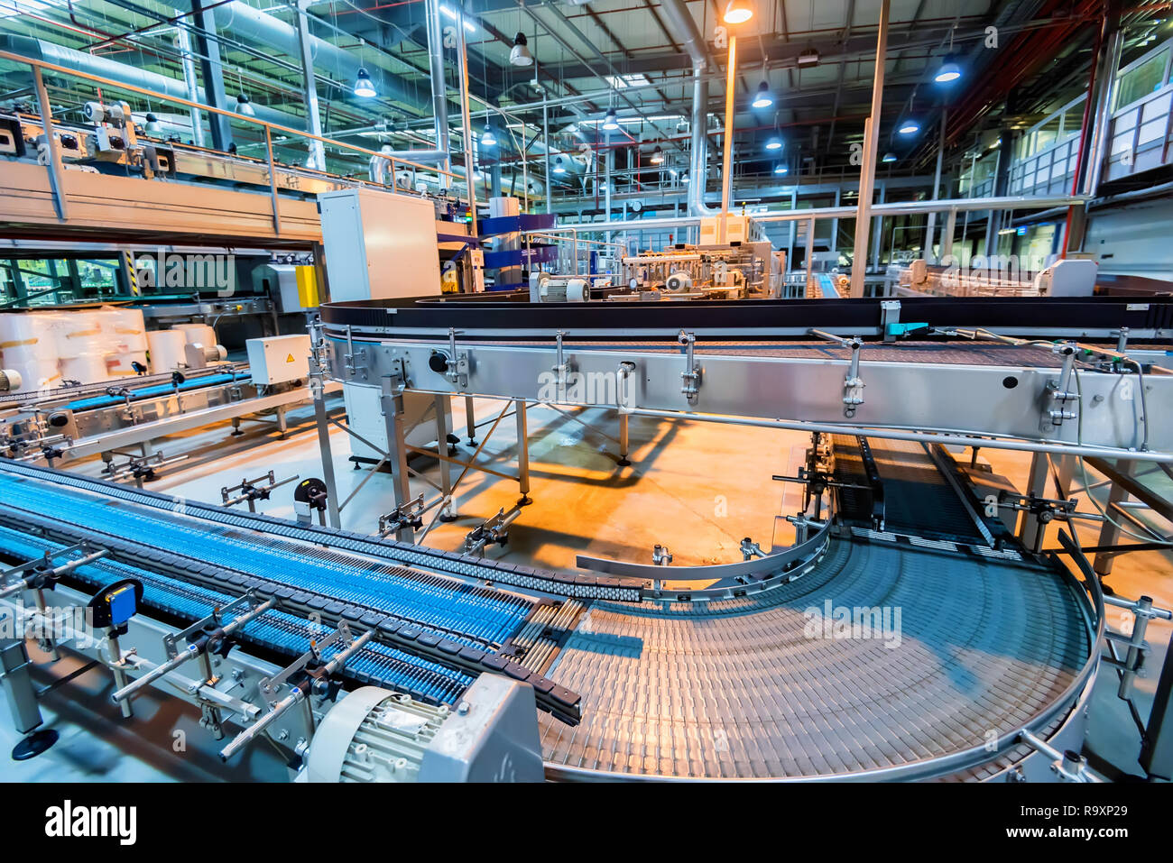 View of tubes and appliances at soft drinks factory Stock Photo Alamy