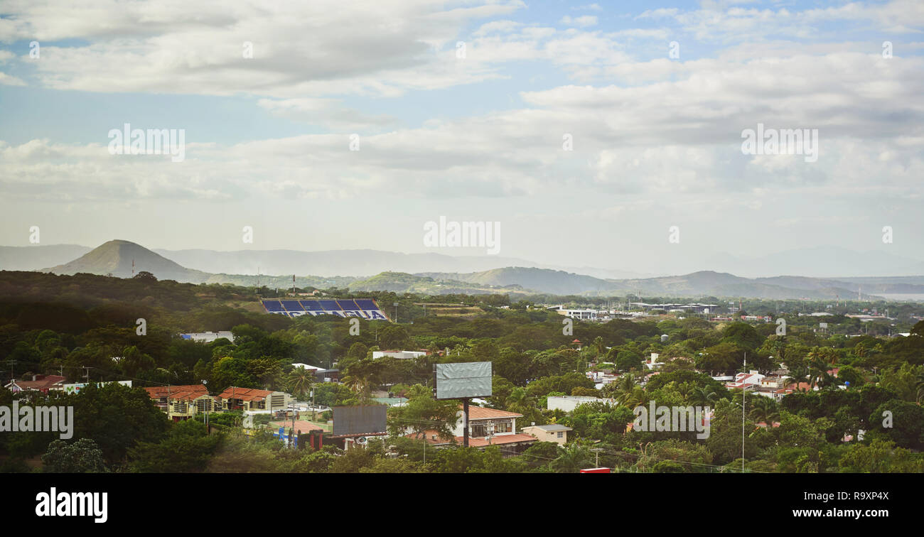 Houses around green trees in Managua NIcaragua aerial view Stock Photo