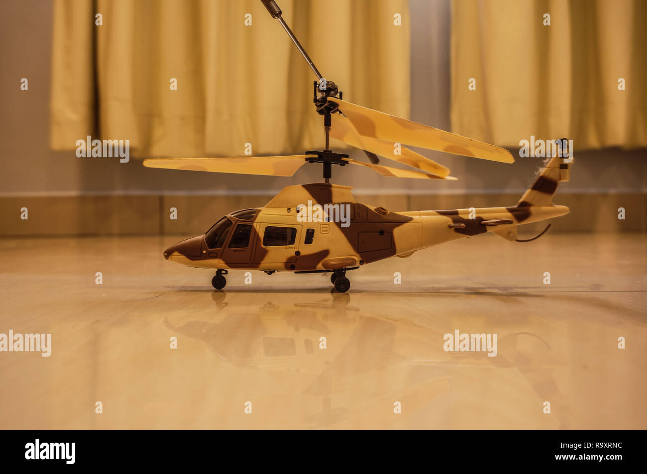 Still live helicopter on floor Stock Photo