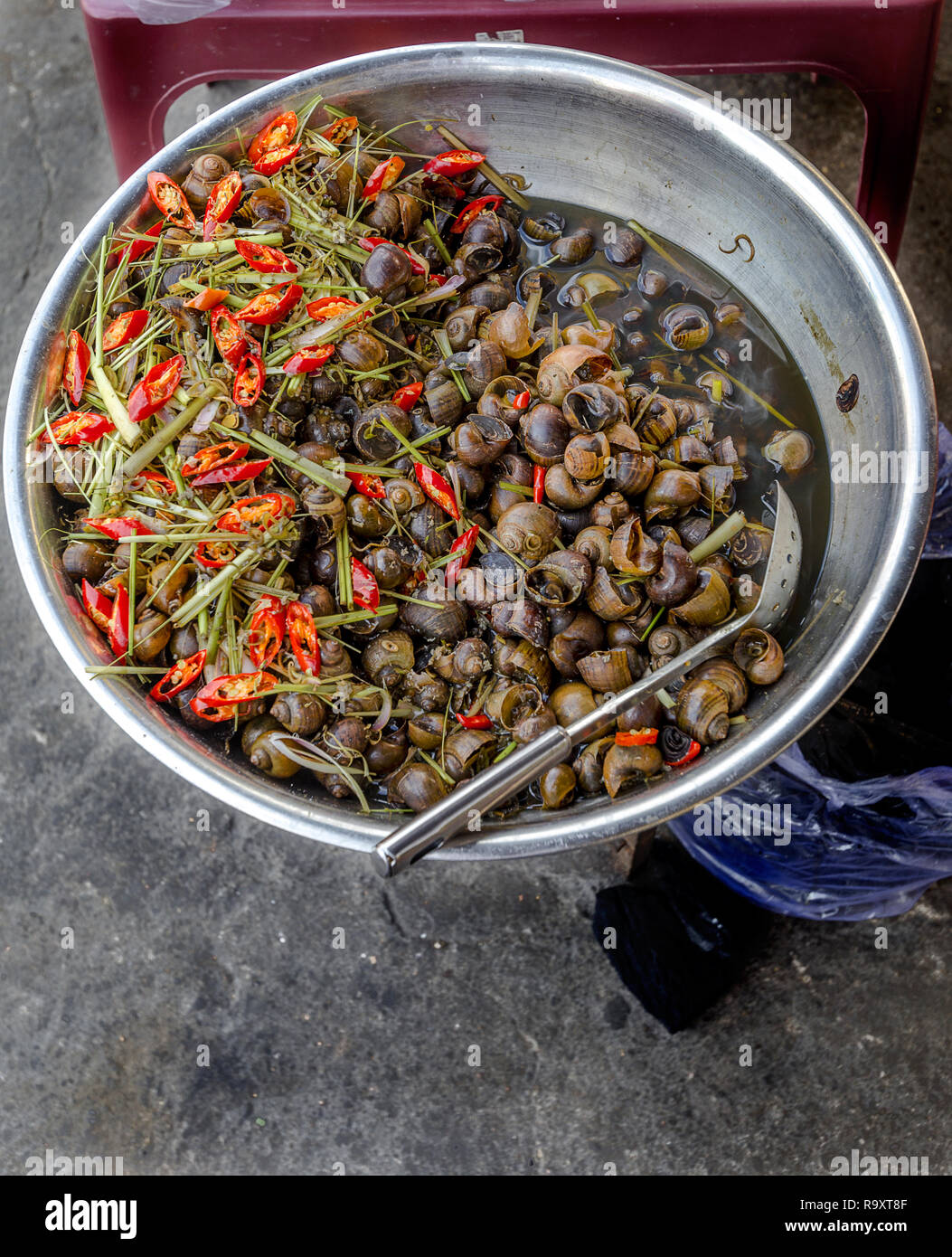 Bowl of Vietnamese snails on the street in DaLat Vietnam Stock Photo