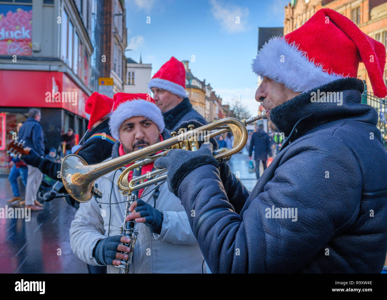 Festive buskers in a city centre Stock Photo Alamy