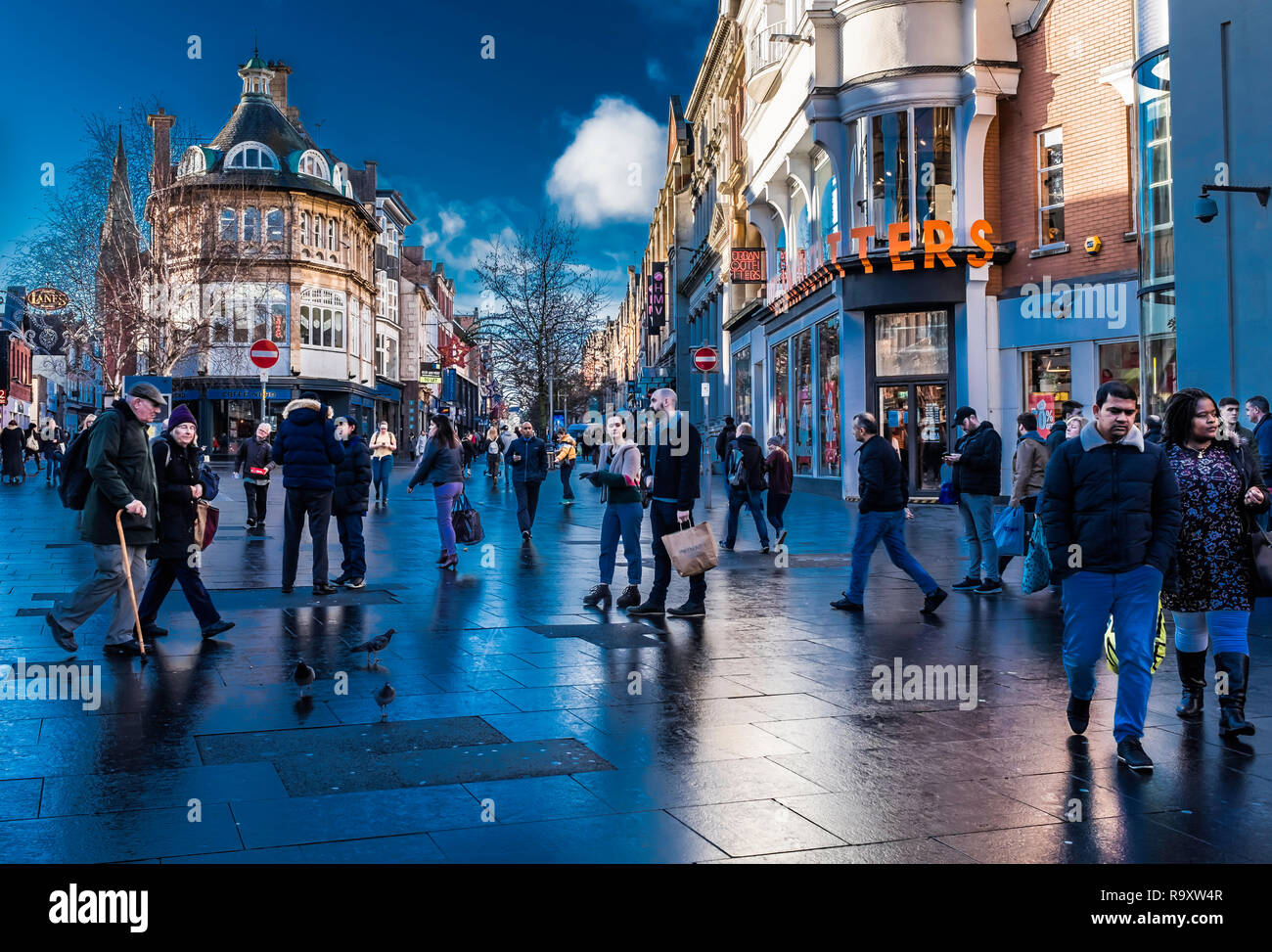 Shoppers in Leicester city centre. Stock Photo