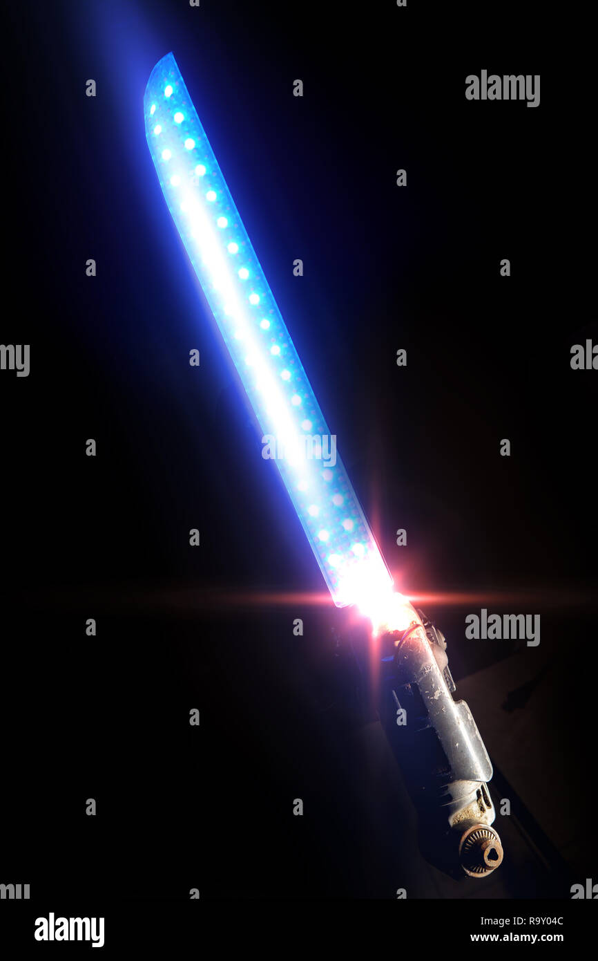 Futuristic magic light laser sword science fiction weapon concept Stock  Photo - Alamy