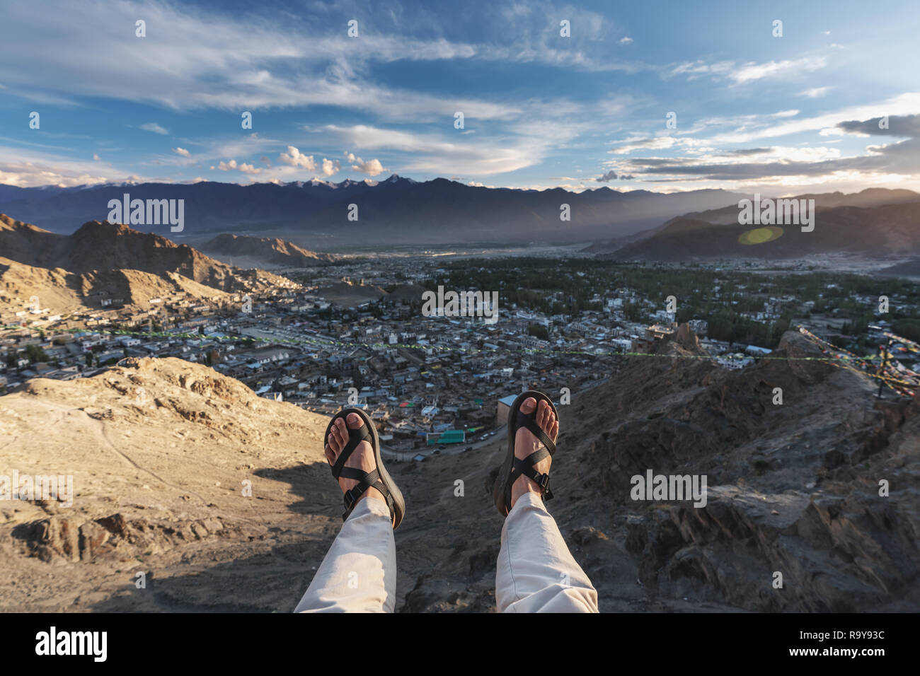 a happy man enjoying beautiful aerial landscape view point in Leh city, in Ladakh region, India. Travel lifestyle and happy holiday vacation Stock Photo