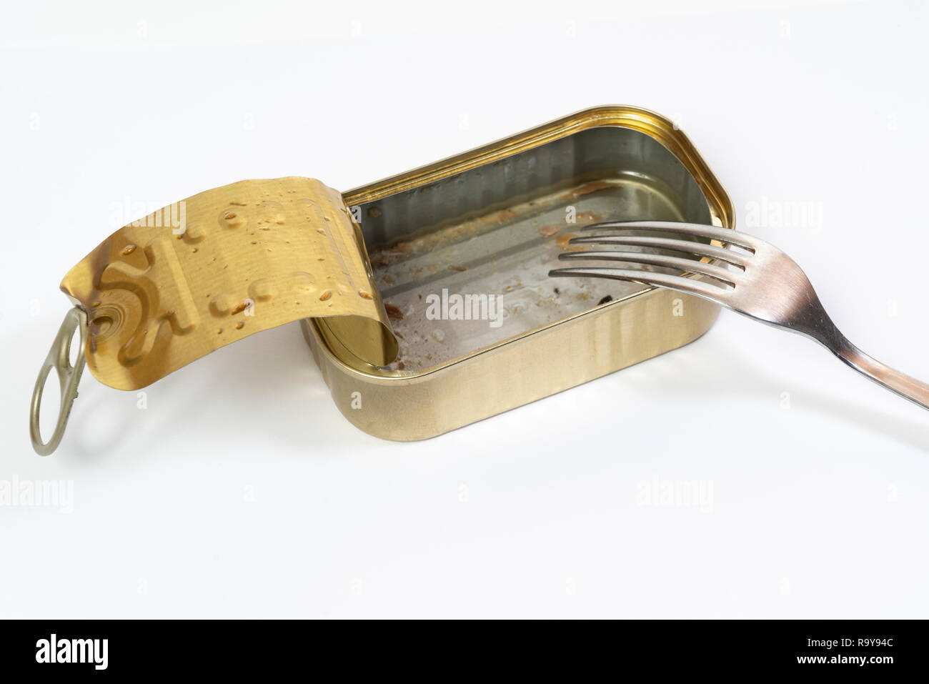 an empty tin of fish in oil Stock Photo