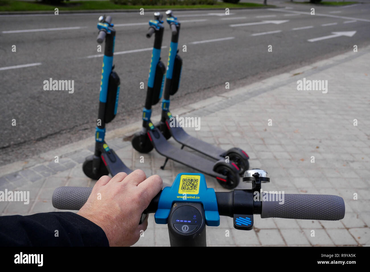 Wind electric Light scooters, Madrid, Spain Stock Photo - Alamy