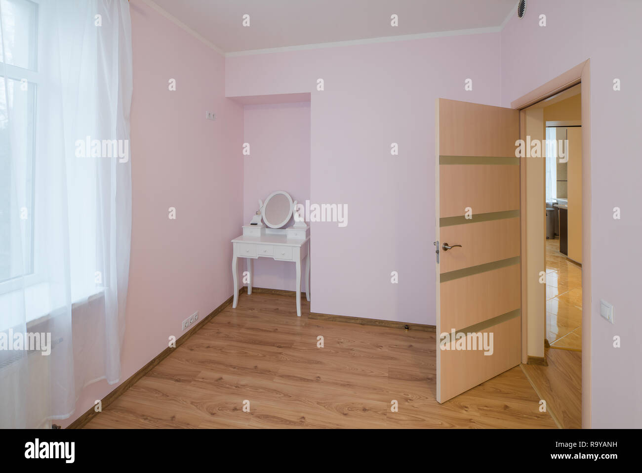 Room In Modern Flat Wooden Door And Make Up Table Stock Photo