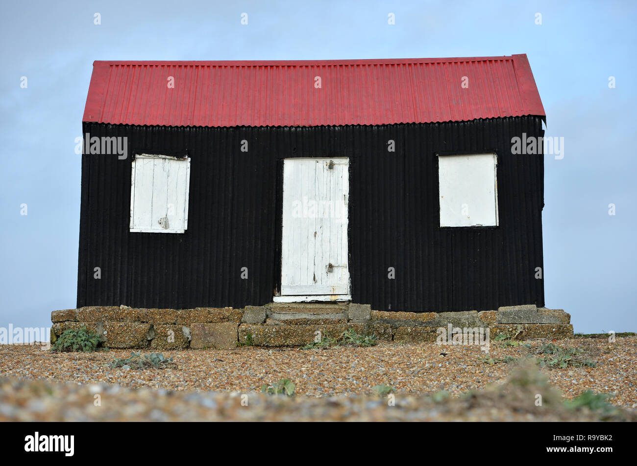 Old fishing hut on Rye Harbour beach, East Sussex. UK Stock Photo