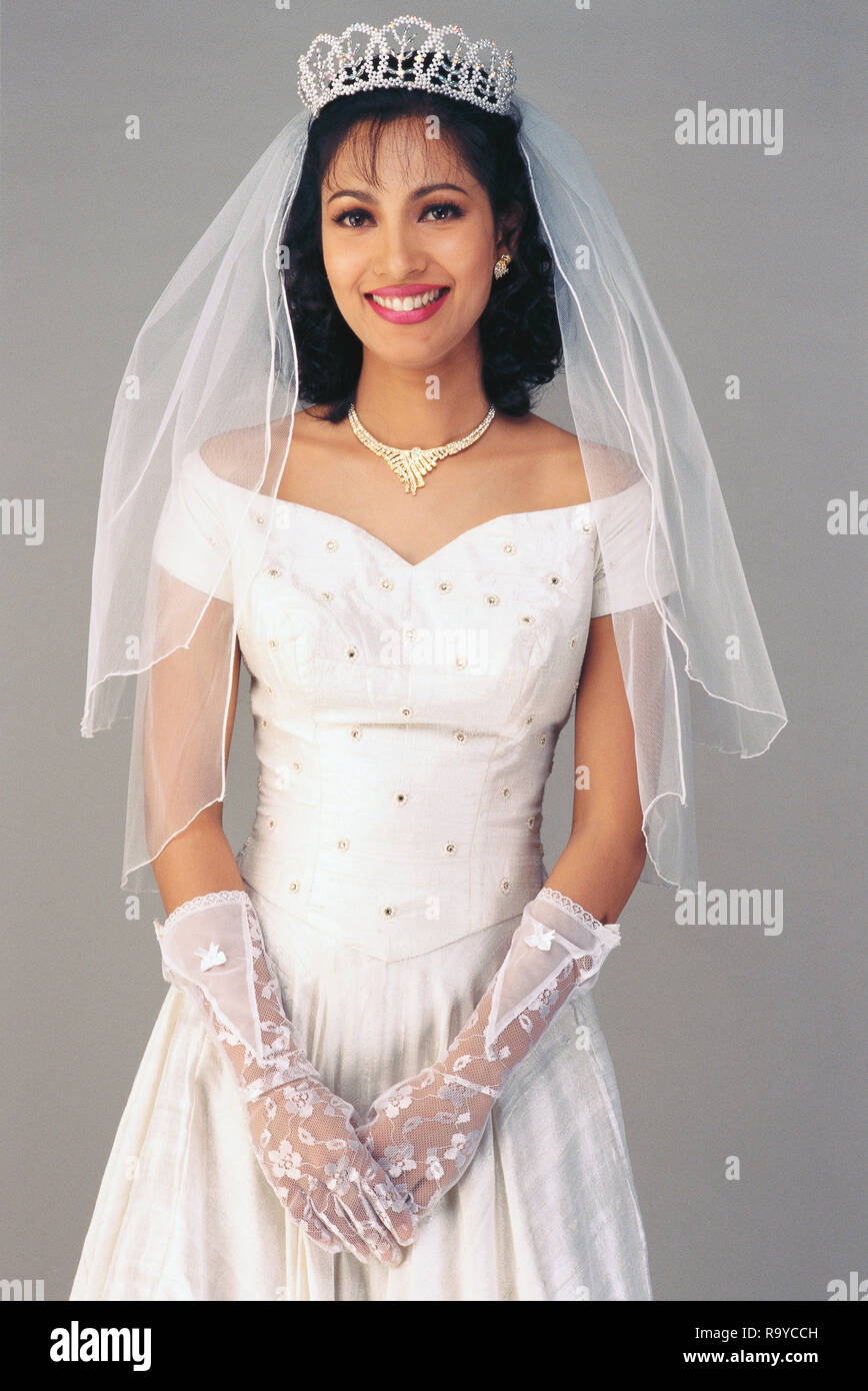 A PORTRAIT OF A CHRISTIAN BRIDE WEARING A TRADITIONAL BRIDAL ...