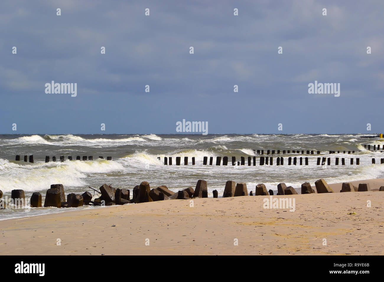 Breakwater on the beach of the Baltic Sea Stock Photo