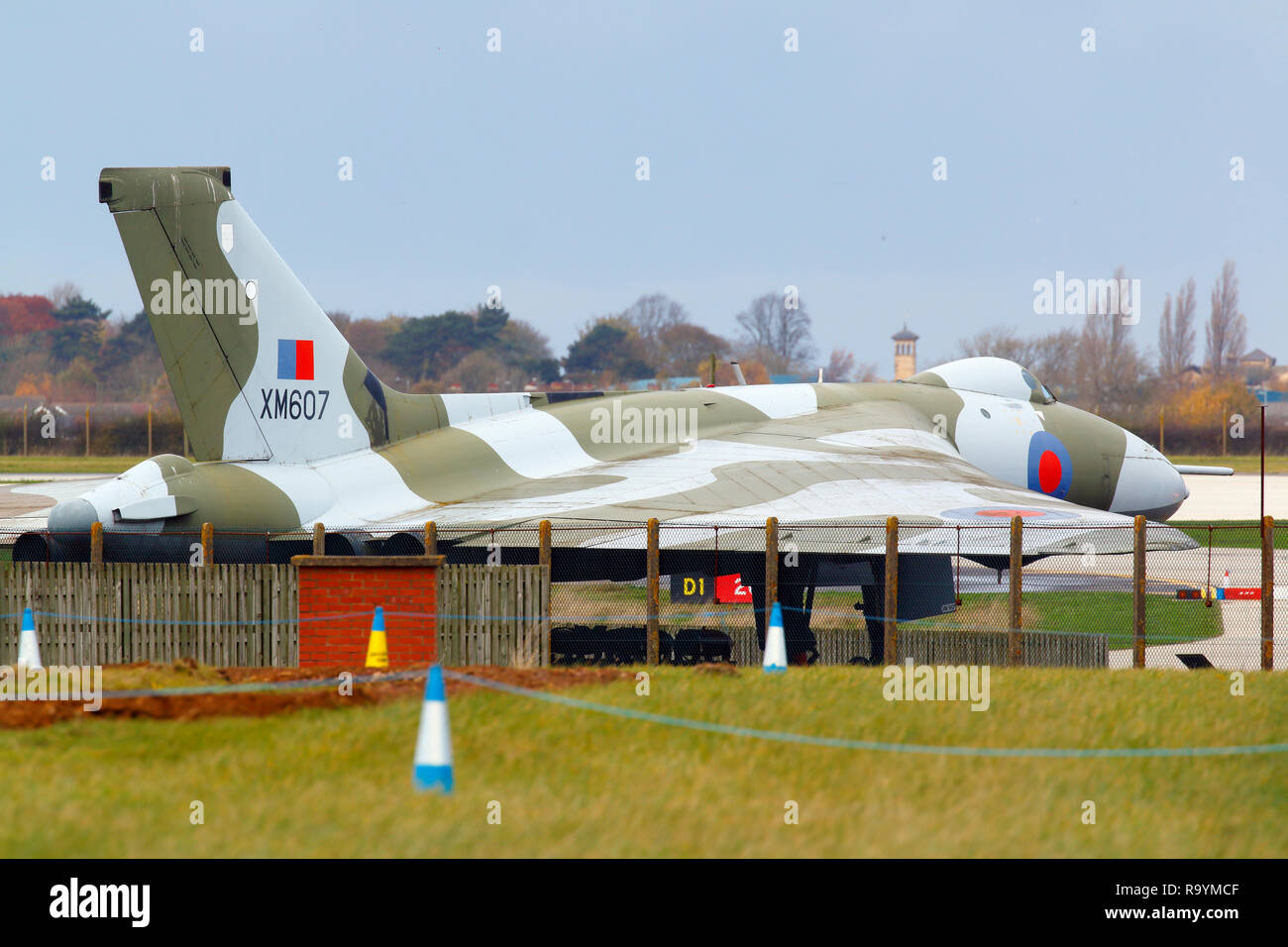 Avro Vulcan Bomber XM607 which was used in the cold war and now rests on the RAF Waddington Airbase in Lincolnshire for passers by to see. Stock Photo