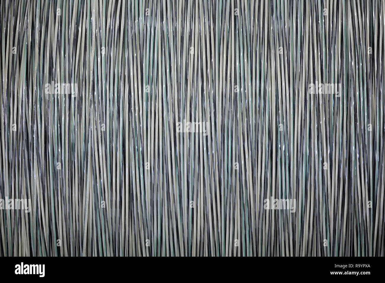 background or backdrop from fiber optic cable on reels Stock Photo