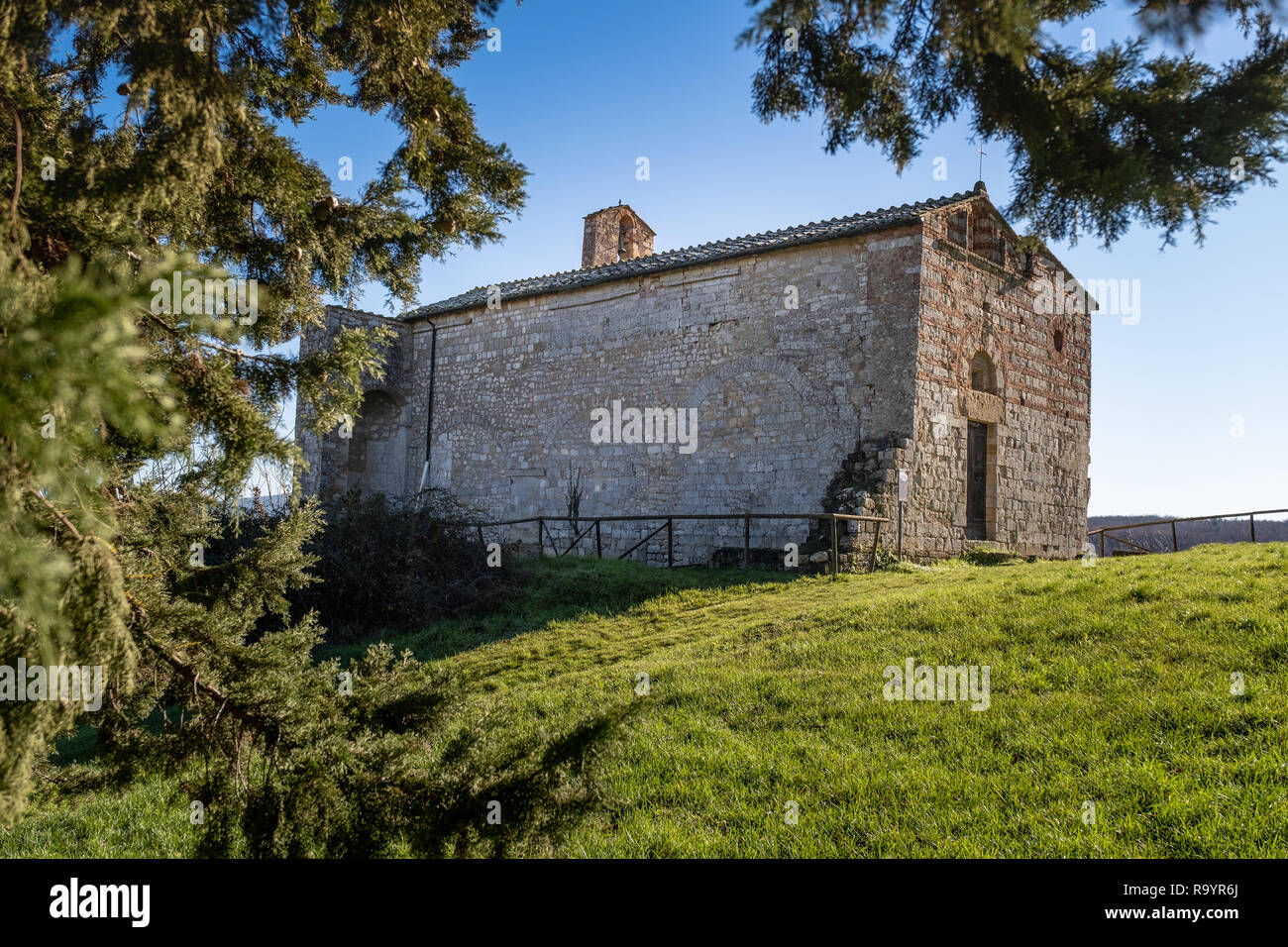 Santi Ippolito and Cassiano romanic church is a place of Catholic worship located in the locality of Coneo, in the municipality of Colle di Val d'Elsa Stock Photo