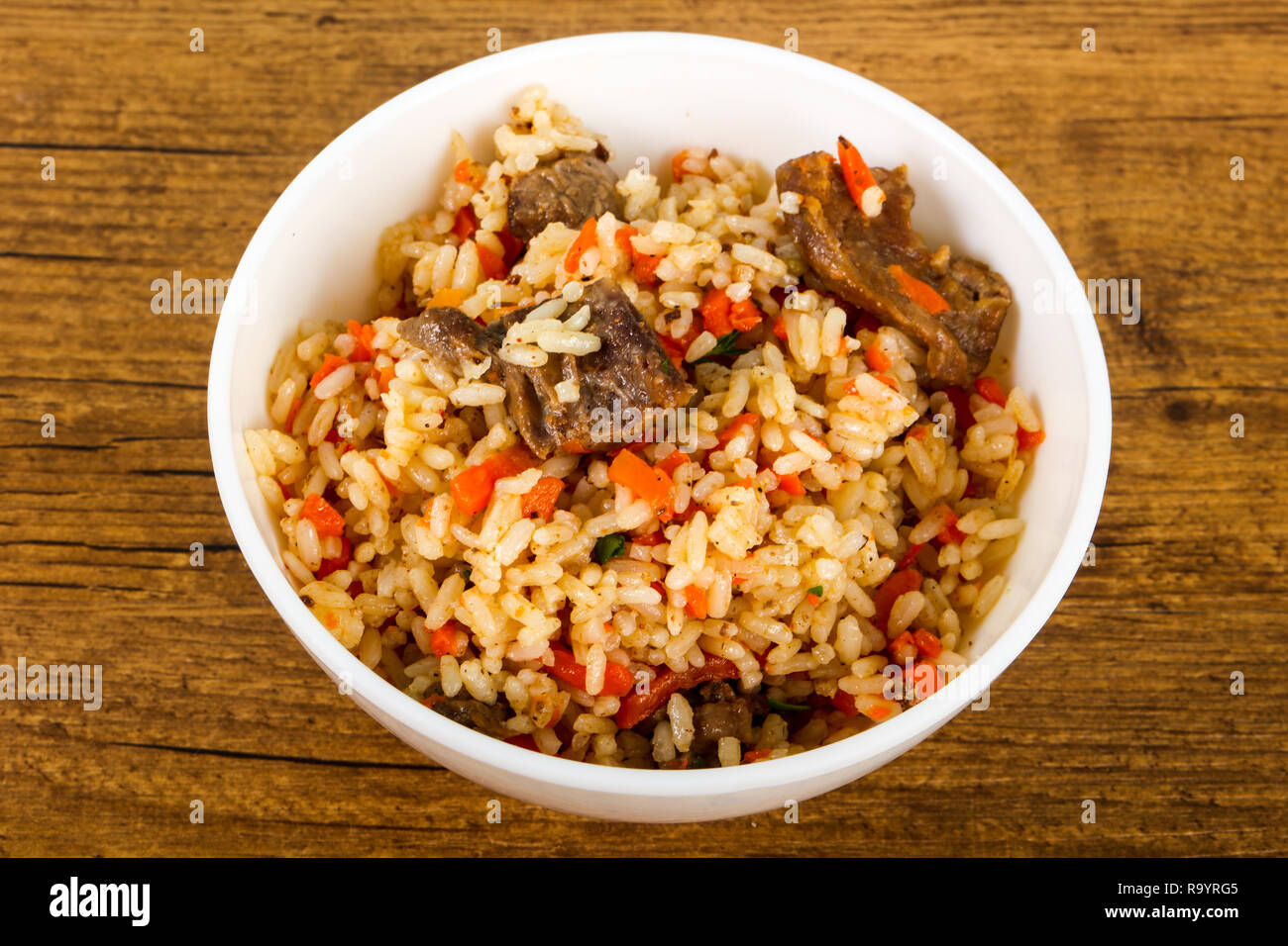 Asian rice - Plov with meat and carrot Stock Photo - Alamy