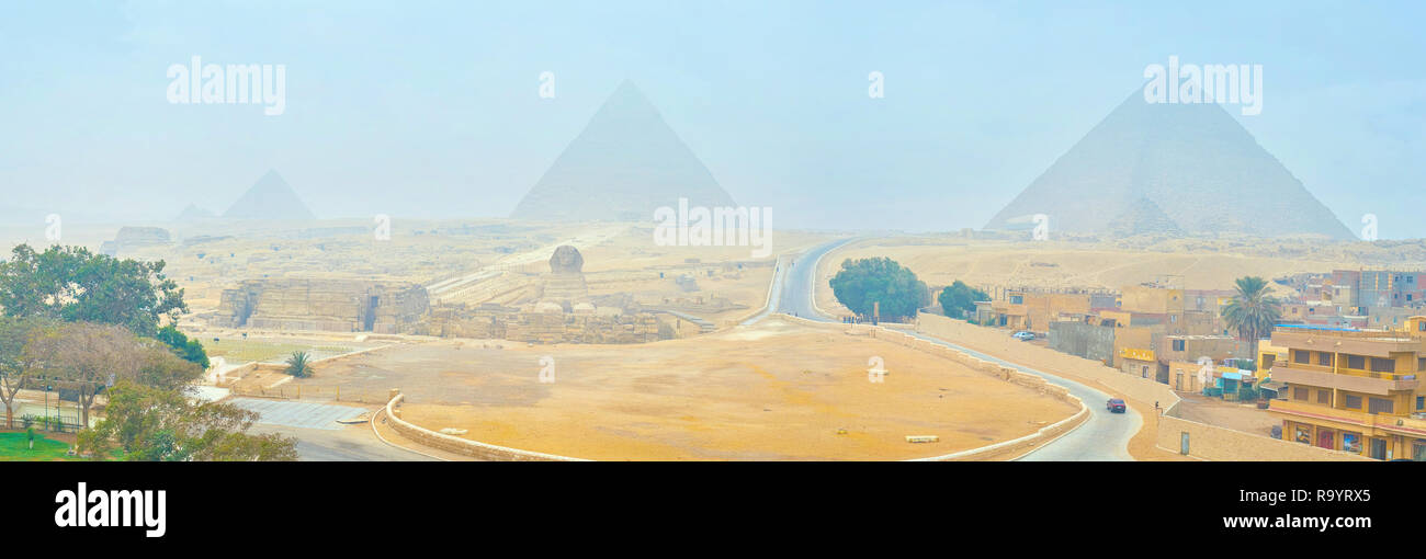 Panorama of Giza Necropolis with a view on ancient Pyramids and Great Sphinx, Egypt Stock Photo
