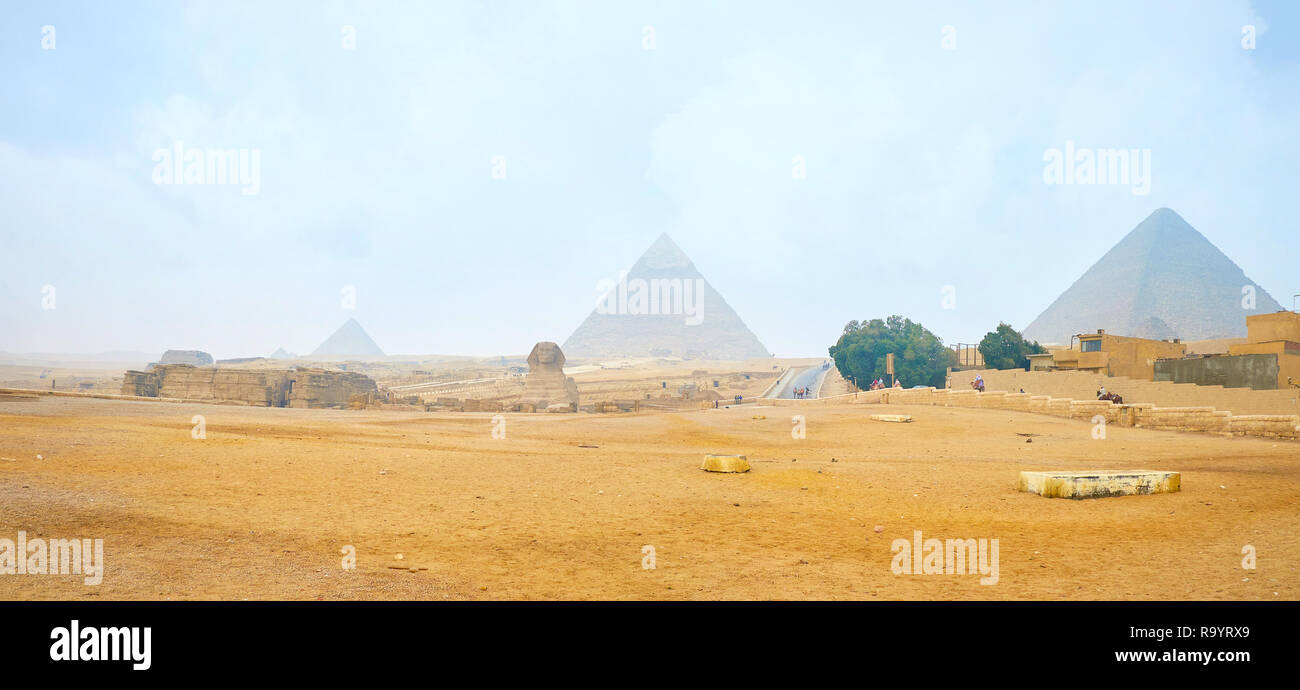 Panoramic view on Giza archaeological site with Pyramids and Great Sphinx on the middle, Egypt Stock Photo
