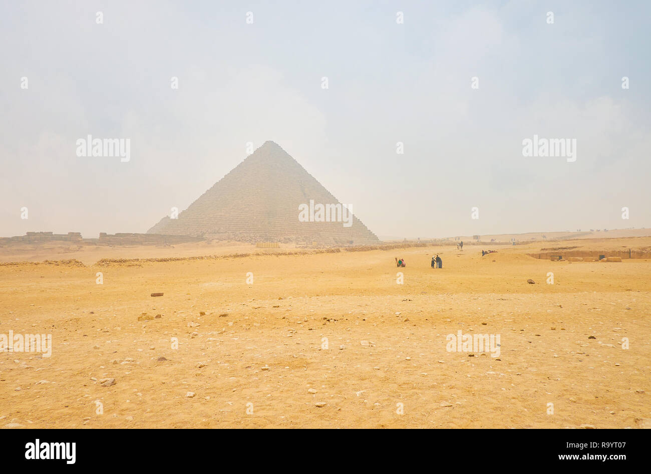The typical winter weather with mist shrouded pyramids of Giza complex ...