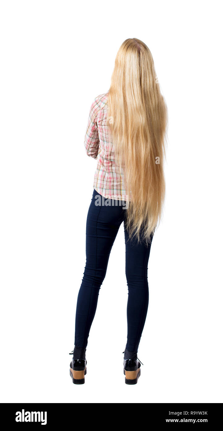 back view of standing young beautiful woman. girl watching. Rear view  people collection. backside view of person. Girl with very long hair standi  Stock Photo - Alamy