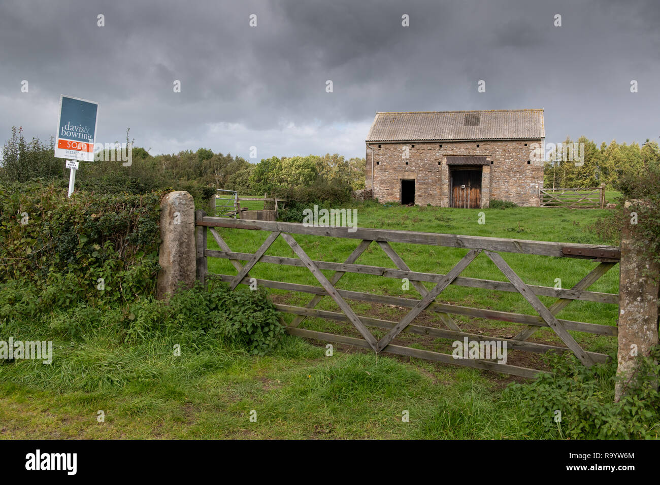 Barn with planning permission and land for sale in Lancashire, UK. Stock Photo