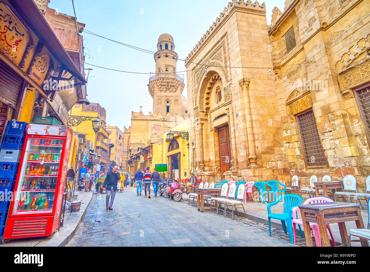 CAIRO, EGYPT - DECEMBER 20, 2017: El Gamaleya street is a fine example of real Egyptian life, with numerous medieval religion complexes, endless marke Stock Photo