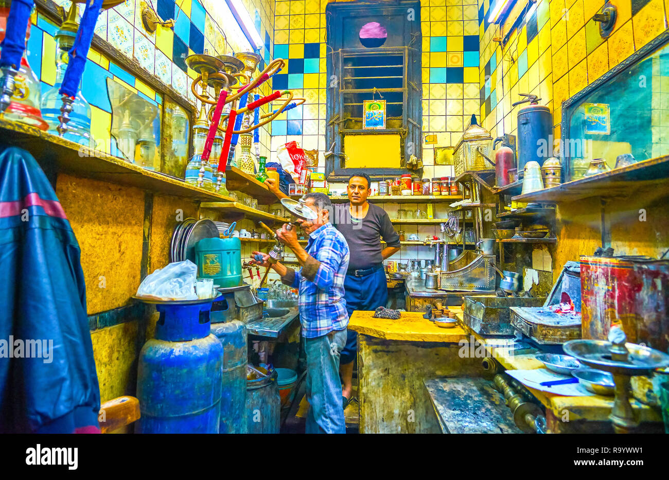 CAIRO, EGYPT DECEMBER 20, 2017 The small kitchen in cheap teahouse with resting chef and