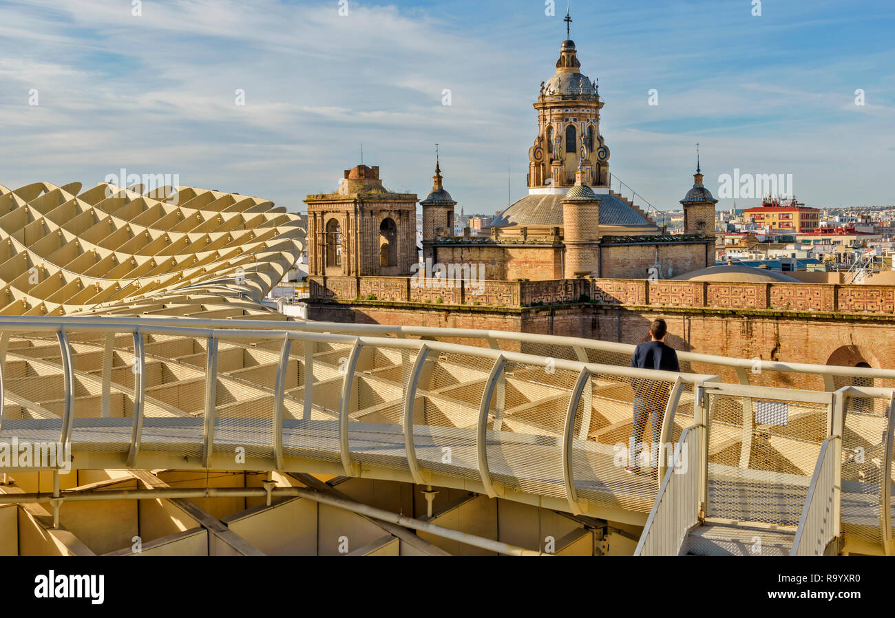 METROPOL PARASOL LA ENCARNACION SQUARE SEVILLE SPAIN EARLY MORNING BLUE SKY AND CHURCH TOWER SEEN FROM A WALKWAY ON THE TOP OF THE STRUCTURE Stock Photo