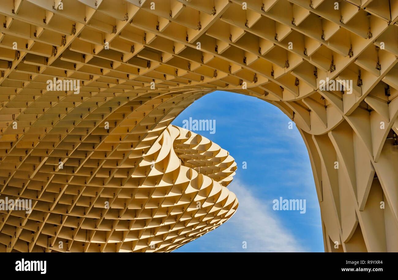 METROPOL PARASOL LA ENCARNACION SQUARE SEVILLE SPAIN EARLY MORNING BLUE SKY AND INTERIOR OF THE WOODEN STRUCTURE Stock Photo