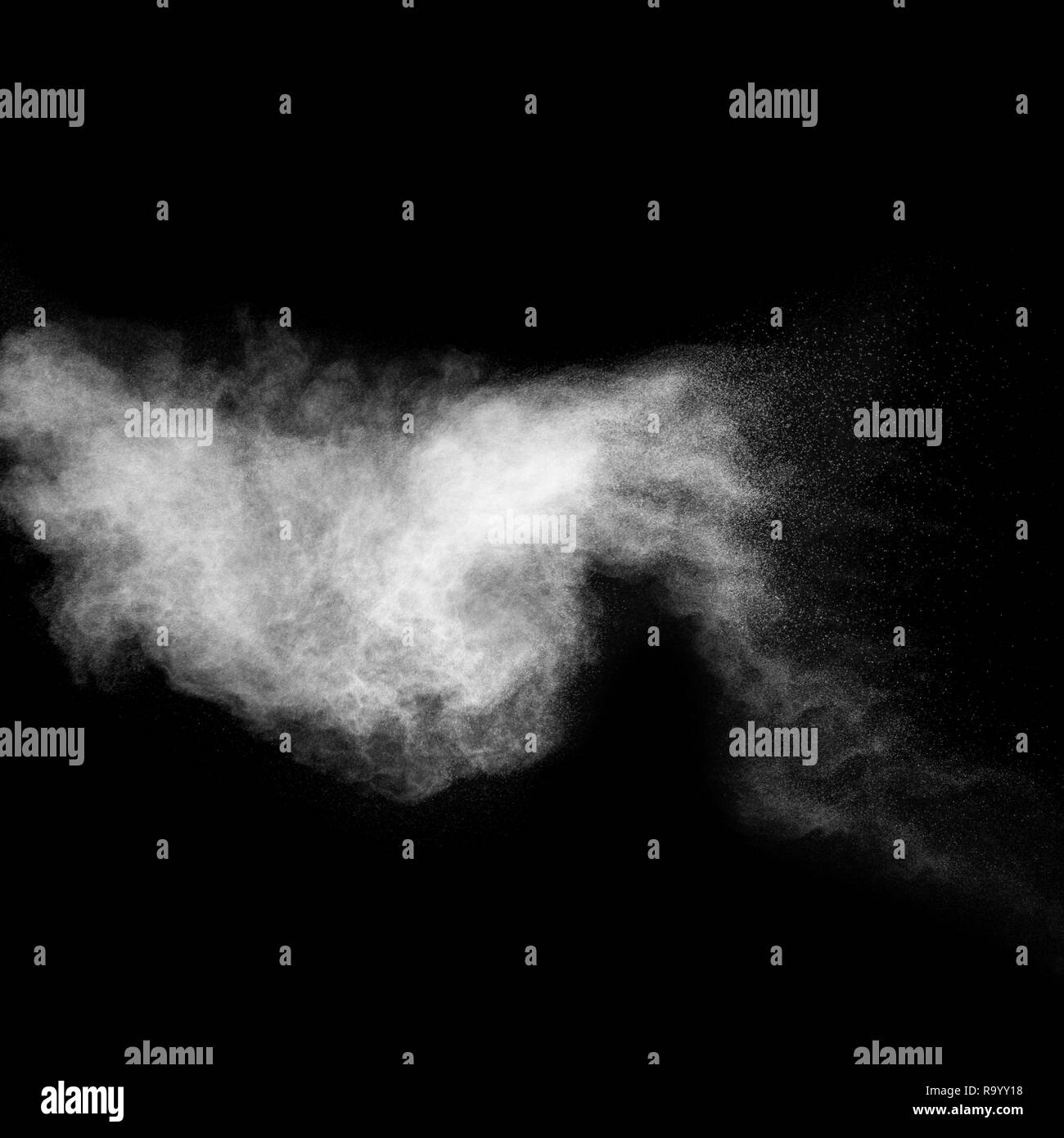 Bizarre forms of white powder explosion on white background.Launched